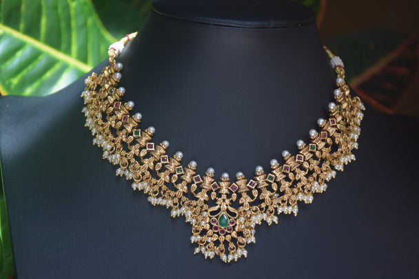 Intricate Gold Polish Pearly Ruby & Green Stone Necklace Set