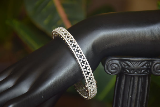 Intricate Diamond-Studded Bangles with Clasp Closure