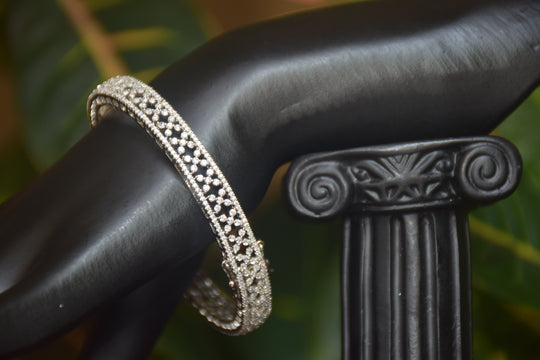 Intricate Diamond-Studded Bangles with Clasp Closure