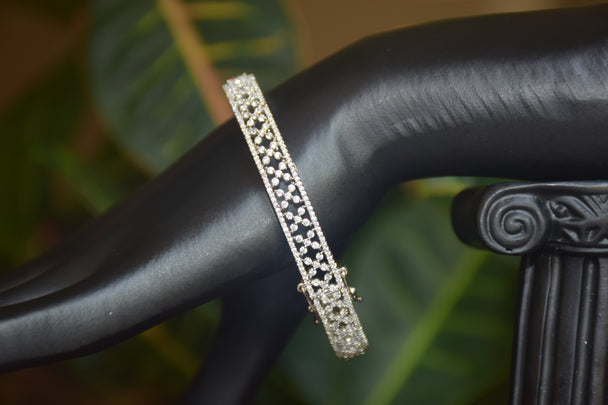 Intricate Diamond-Studded Bangles with Clasp Closure