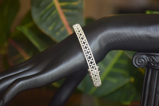 Intricate Diamond-Studded Bangles with Clasp Closure