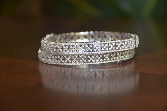 Intricate Diamond-Studded Bangles with Clasp Closure