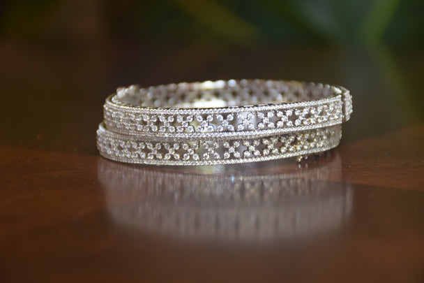 Intricate Diamond-Studded Bangles with Clasp Closure