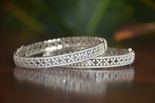 Intricate Diamond-Studded Bangles with Clasp Closure