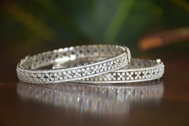 Intricate Diamond-Studded Bangles with Clasp Closure