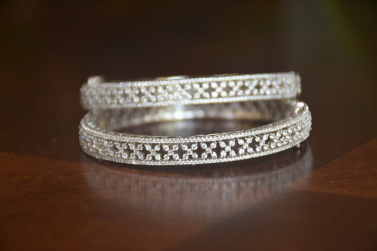 Intricate Diamond-Studded Bangles with Clasp Closure